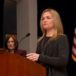 Woman speaks at event